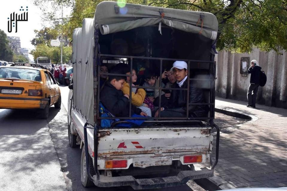 Children use a pick-up truck for school runs due lack of public transport (Damascus - November 2022)