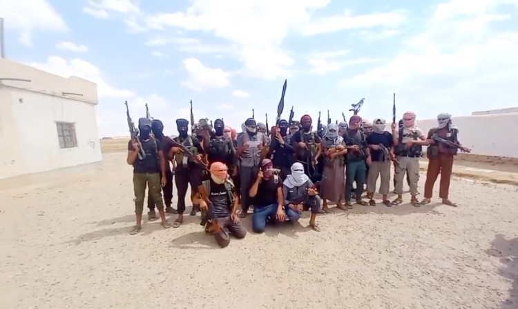 Responding to longstanding tensions and the sudden arrest of Abu Khawla, several tribes in Deir Ezzor have mobilized against the SDF. Pictured here are fighters from the Akidat and Al-Bakara tribes announcing their intent to target SDF sites in the province. (Source: Levant 24)